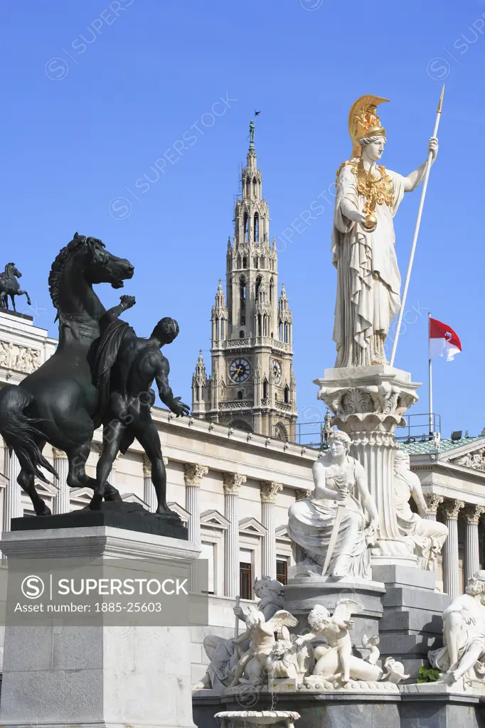Austria, Vienna, Parliament  with statues and Rathaus - City Hall