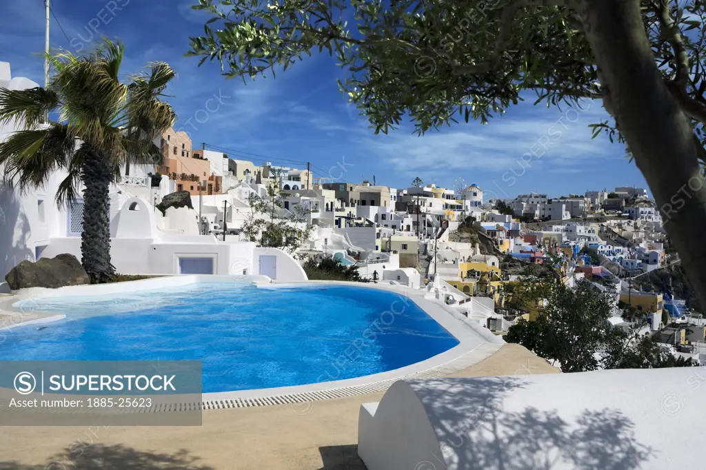 Greek Islands, Santorini Island, Firostefani, View of town over swimming pool