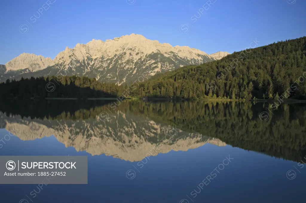 Germany, Bavaria, Mittenwald - near, Karwendel mountains reflected in Lautersee lake