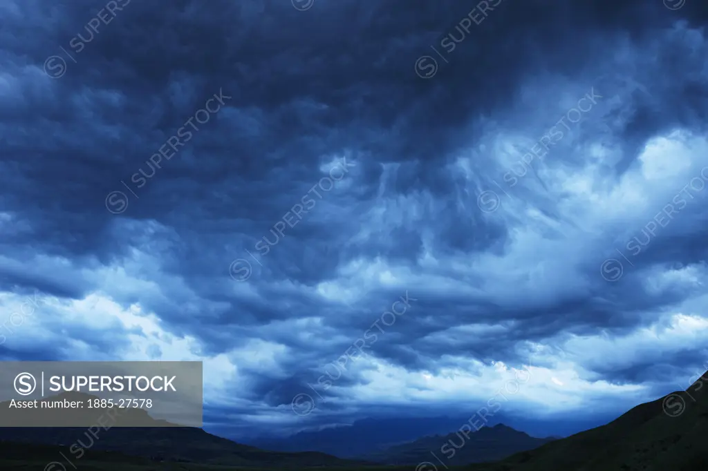 South Africa, KwaZulu Natal, Royal Natal National Park, Stormy evening sky over the Drakensberg Mountains