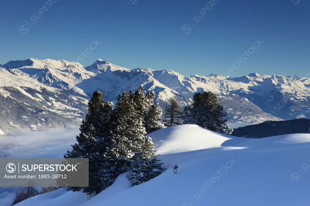 Switzerland, Valais Canton, La Tzoumas - near, Snow scene above alpine village
