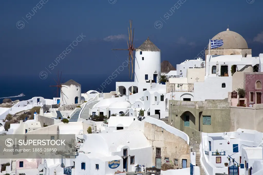 Greek Islands, Santorini Island, Oia, White townscape with windmill