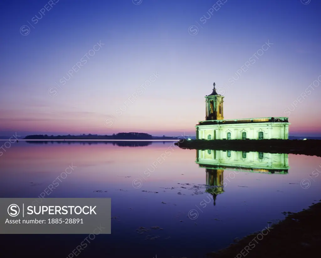 UK - England, Rutland, Rutland Water, View of reservoir and church at dusk