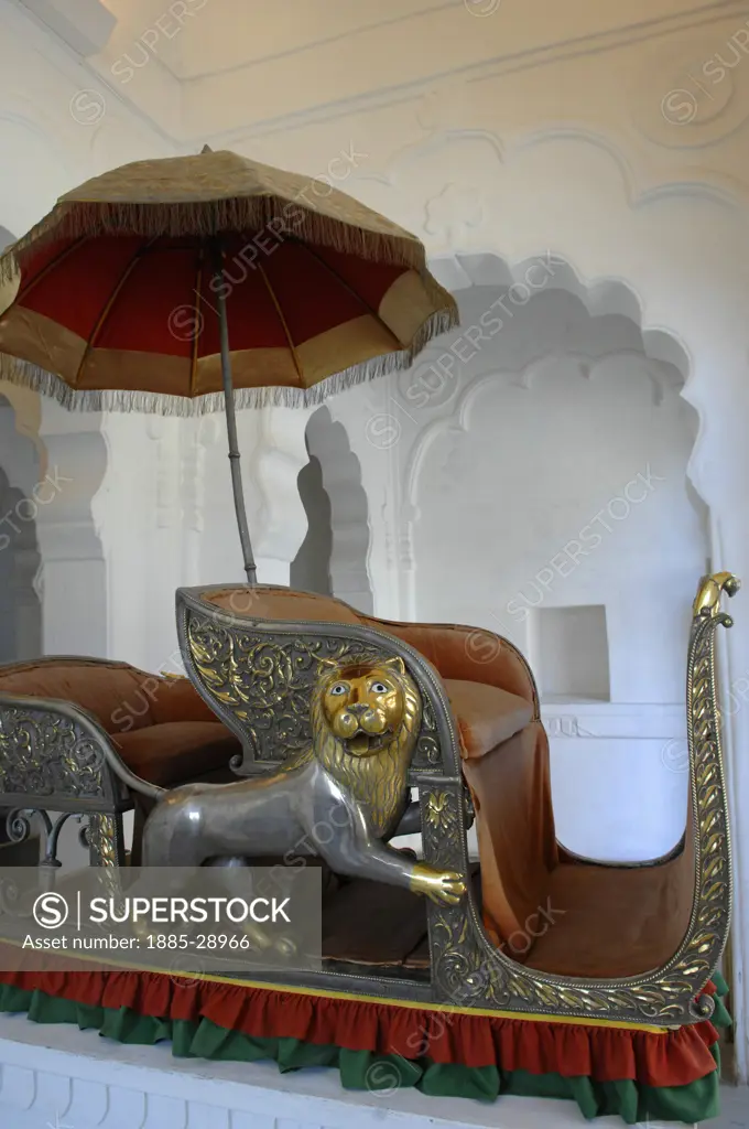 India, Rajasthan, Jodhpur, An ornate palanquin in the Jewel House at Meherangarh Fort