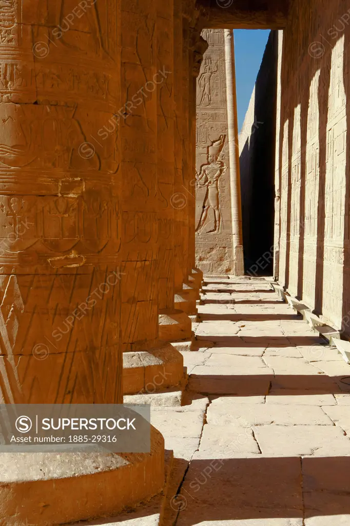 Egypt, Edfu, Wall carving and pillars at Temple of Horus