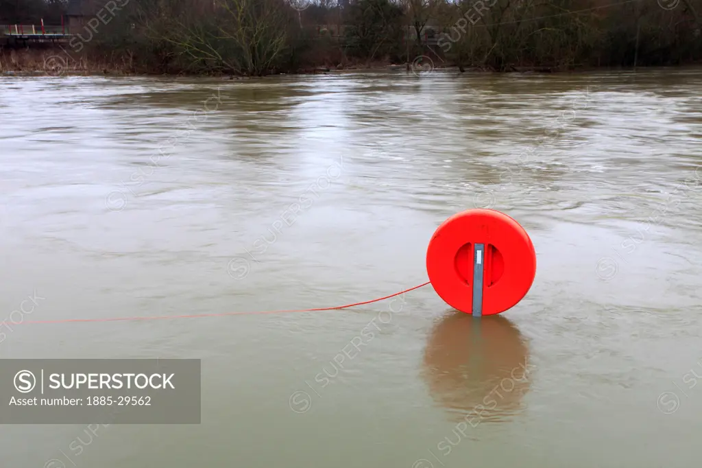 Image of a Lifebelt, Flooded river Nene at Orton Mere lockgate sluices, Peterborough, Cambridgeshire, England, UK