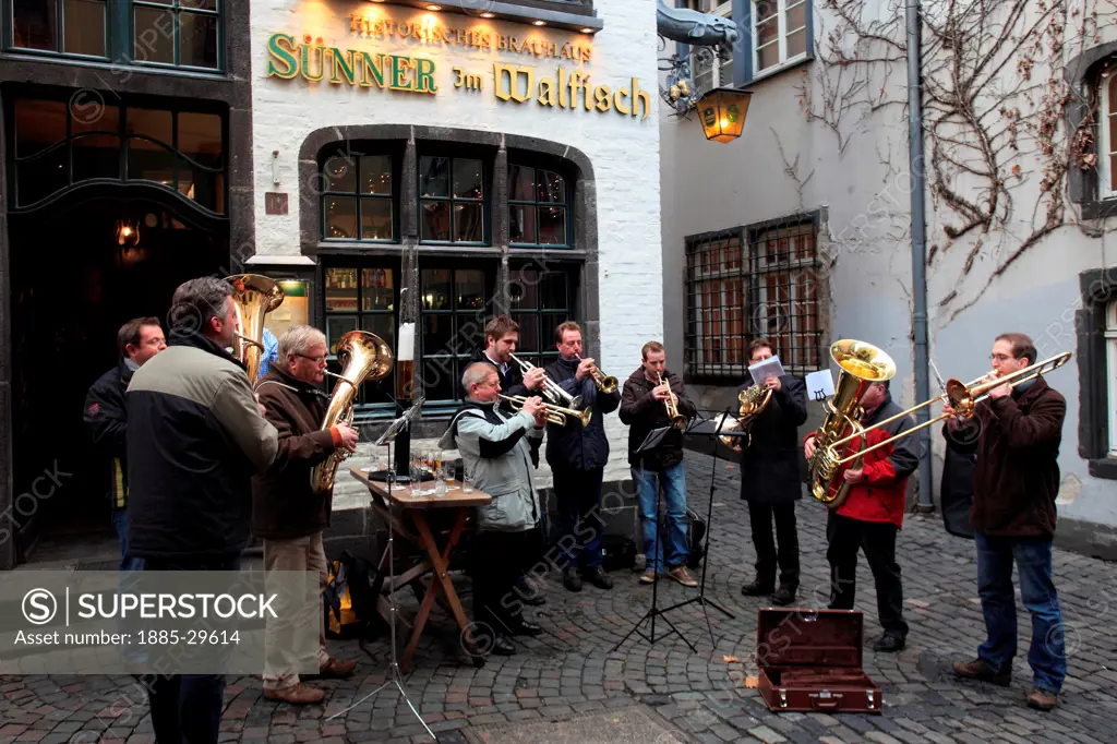 Brass Band playing in the Fischmarket area of Cologne City, North Rhine-Westphalia, Germany, Europe