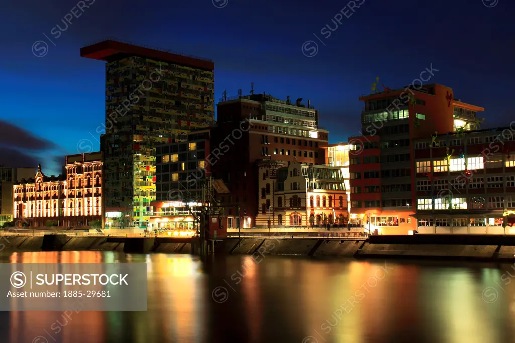 Modern Office buildings in the Media Harbour at night, DŸsseldorf City, North-Rhine-Westphalia, Germany, Europe.