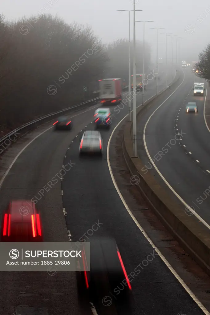 Traffic in thick fog, A47 Dual Carridgeway, Peterborough, Cambridgeshire; England, UK