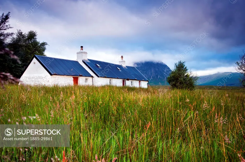 Black Rock Cottage in the Glencoe region of the Scottish Highlands, with Buachaille Etive Mor behind