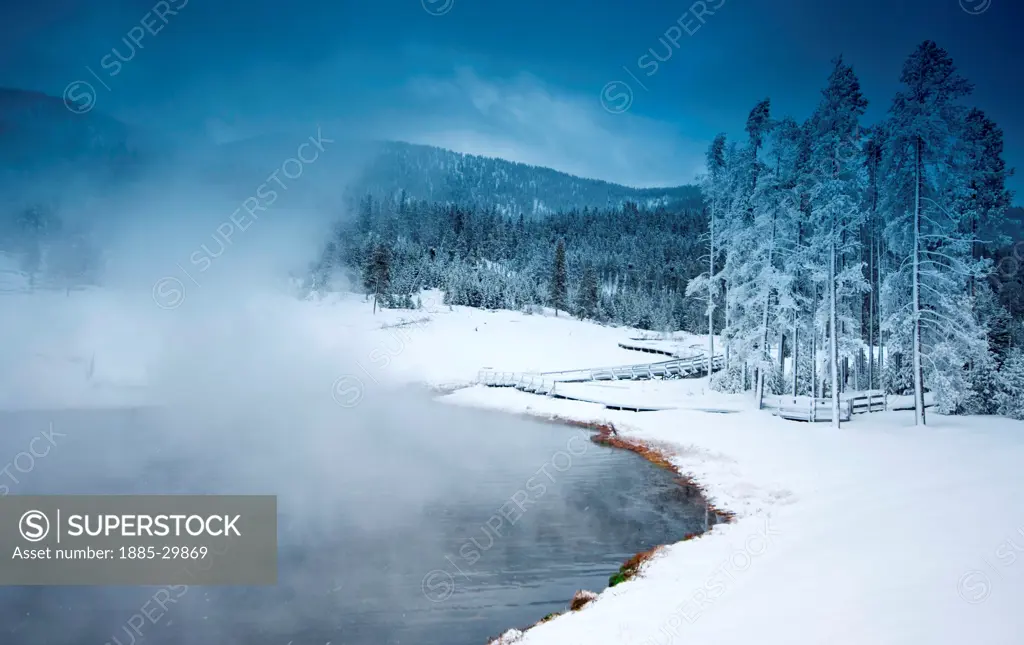 Hot spring in Yellowstone National Park, United States, in the winter