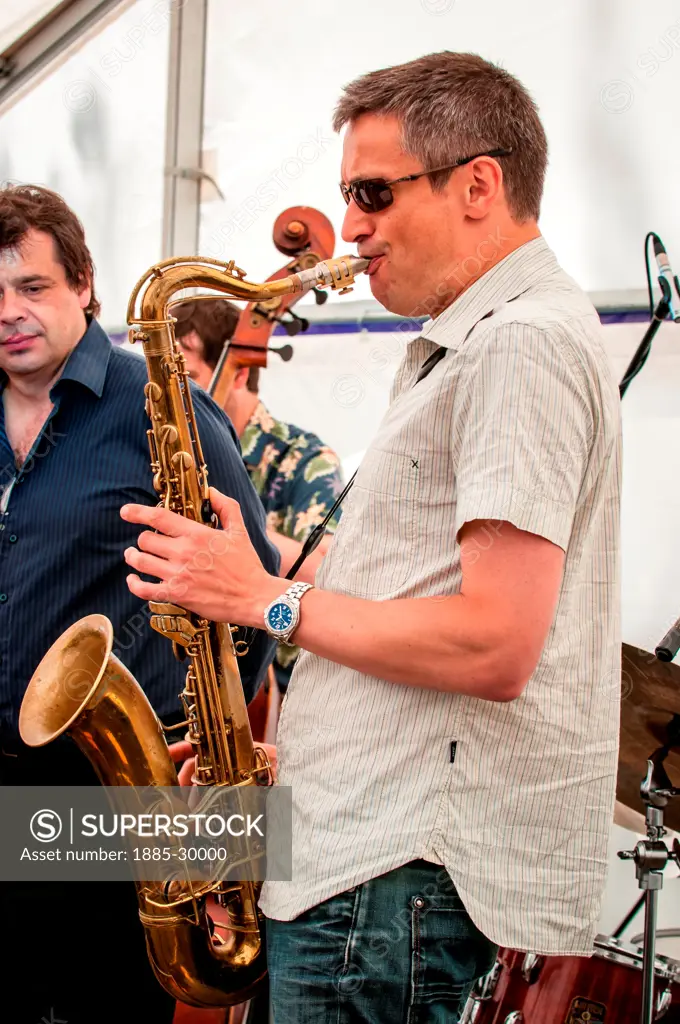 Dave O'Higgins playing tenor saxophone with Steve Waterman at the Swanage Jazz festival, Dorset, England