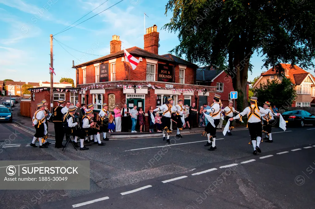 Morris dancers give a performance outside a public house in Southampton, England.