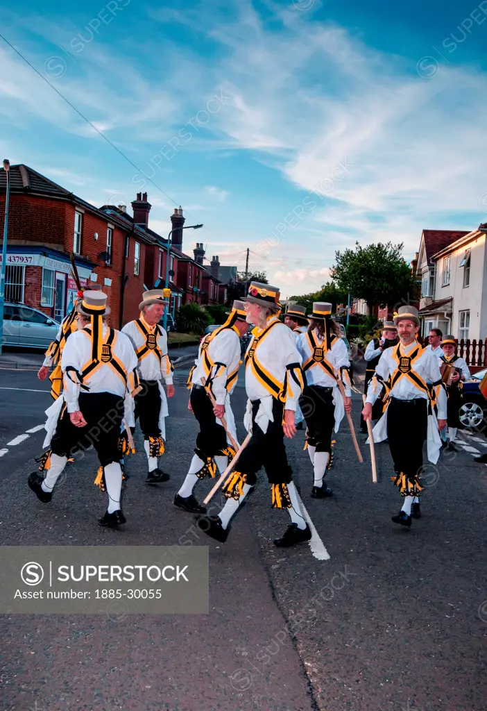 Morris dancers give a performance outside a public house in Southampton, England.