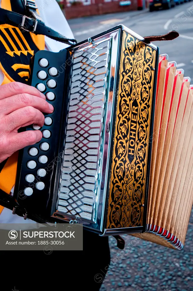 Piano accordion made by Hohner played by Morris dancer, Southampton, England