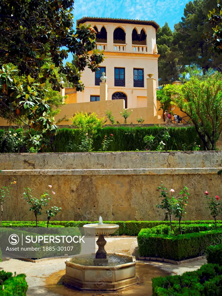 A palace within a garden in the Generalife of Granada