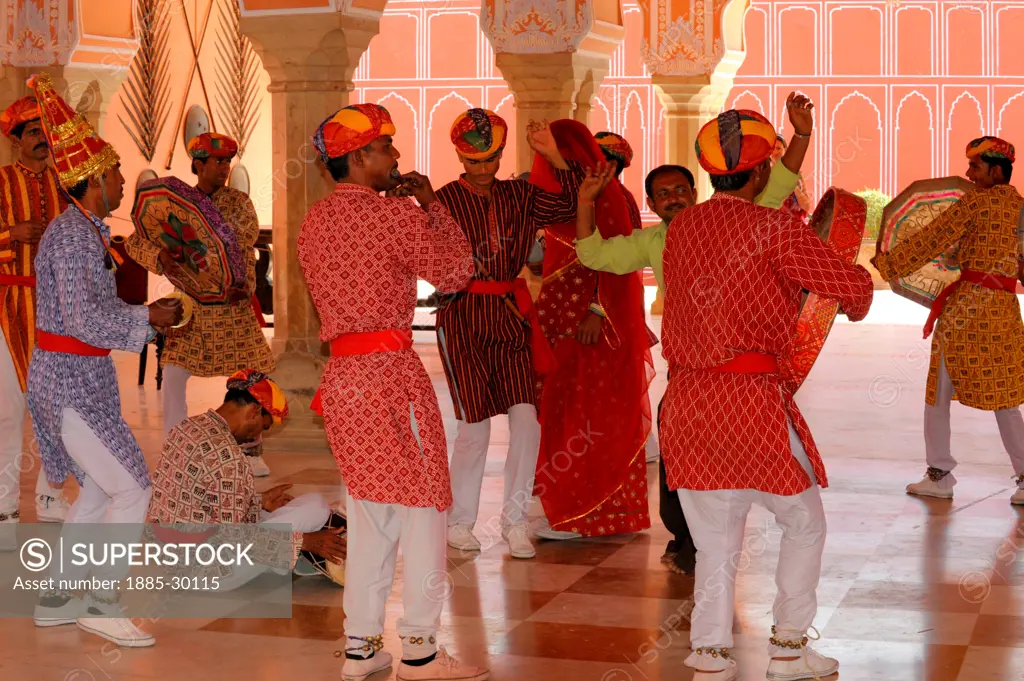 A traditional dance troupe performing in the City Palace of Jaipur, in Rajasthan, India