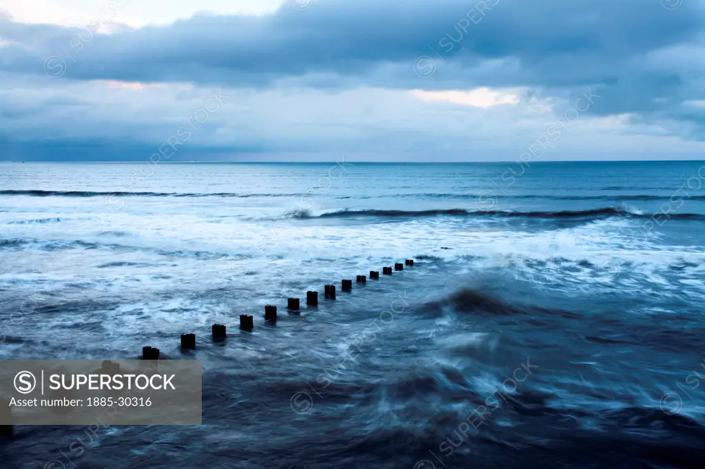 Groynes and Incoming Tide at Bridlington East Riding of Yorkshire England
