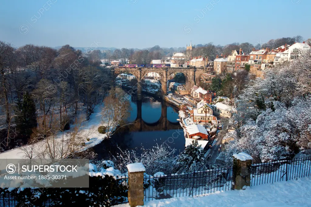 Train Crossing the Railway Viaduct over the Nidd at Knaresborough in Winter Yorkshire England
