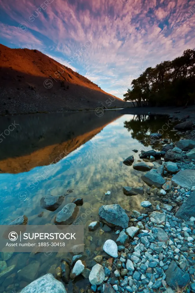 Reflection of Clouds at Sunrise on Convict Lake, Mammoth Lakes, California, USA