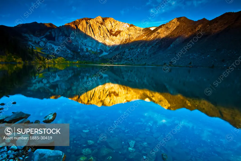 Reflection of Laurel Mountain and Sevehah Cliff Surrounded by Fall Color on Convict Lake, Mammoth Lakes, California, USA