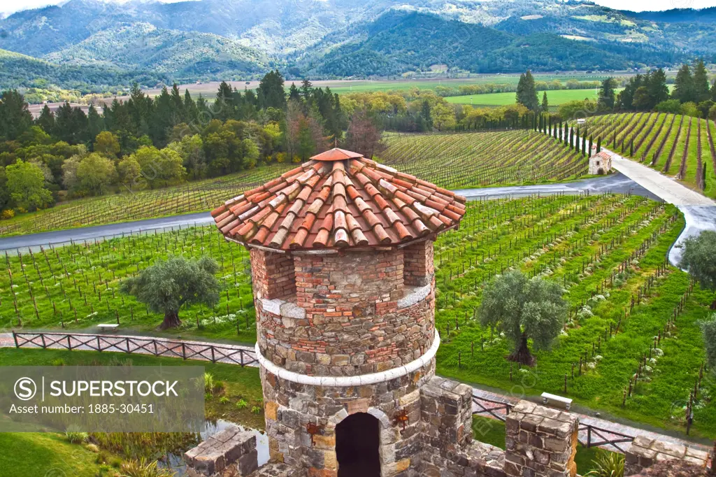 View of Vineyard and  Castle Towers at Castello Di Amorosa Winery, an Italian Style Castle in Napa Valley Near Calistoga, California, USA
