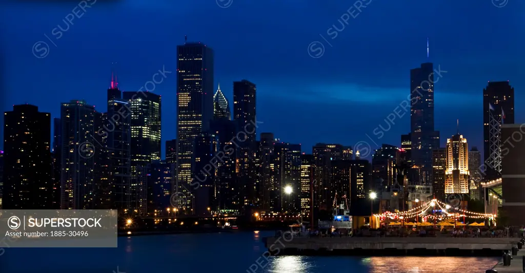 Lights of the Chicago Skyline Across the Harbor at Night, Chicago, Illinois, USA