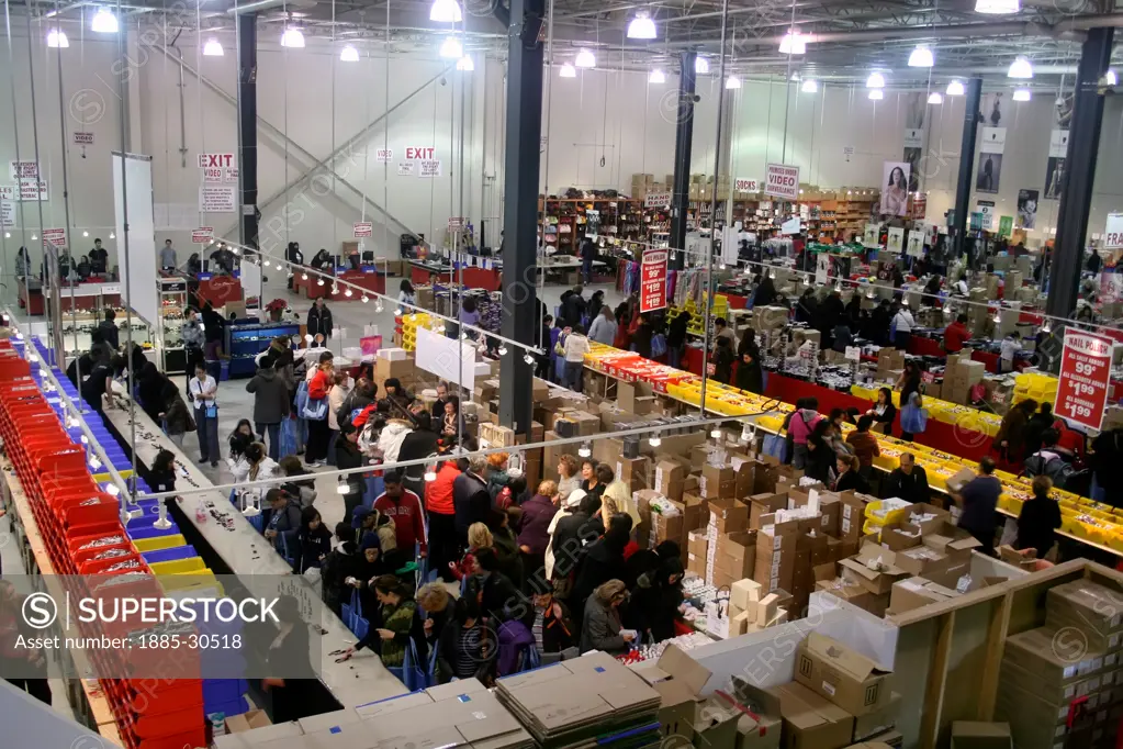 Bird's eye view of shoppers during a warehouse sale for cosmetics and other beauty products in Toronto, Canada.