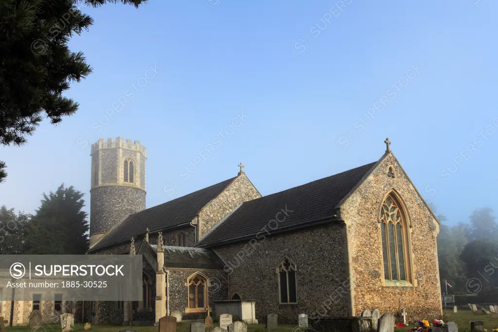 Misty morning, St Remigius parish church, Roydon village, Norfolk County, England, Britain, UK. St Remigius is a Round Tower church.