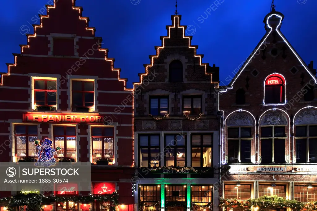 Christmas decorations on buildings in Bruges City, West Flanders, Flemish Region of Belgium.