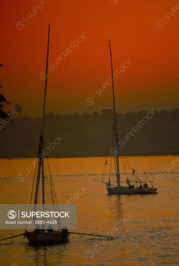 Egypt, , Luxor, River Nile with Felucca at Sunset