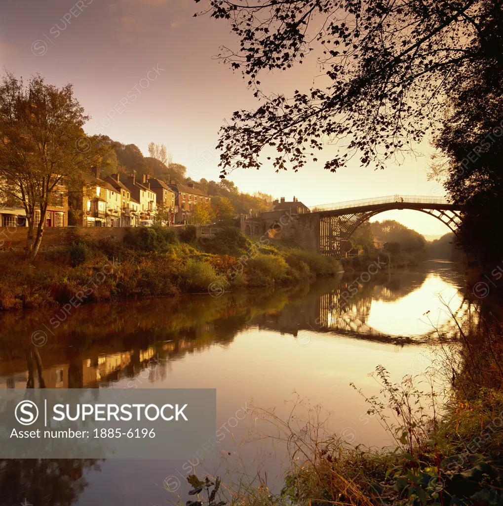 UK - England, Shropshire, Ironbridge, River Severn at Sunrise & View of Bridge & Town