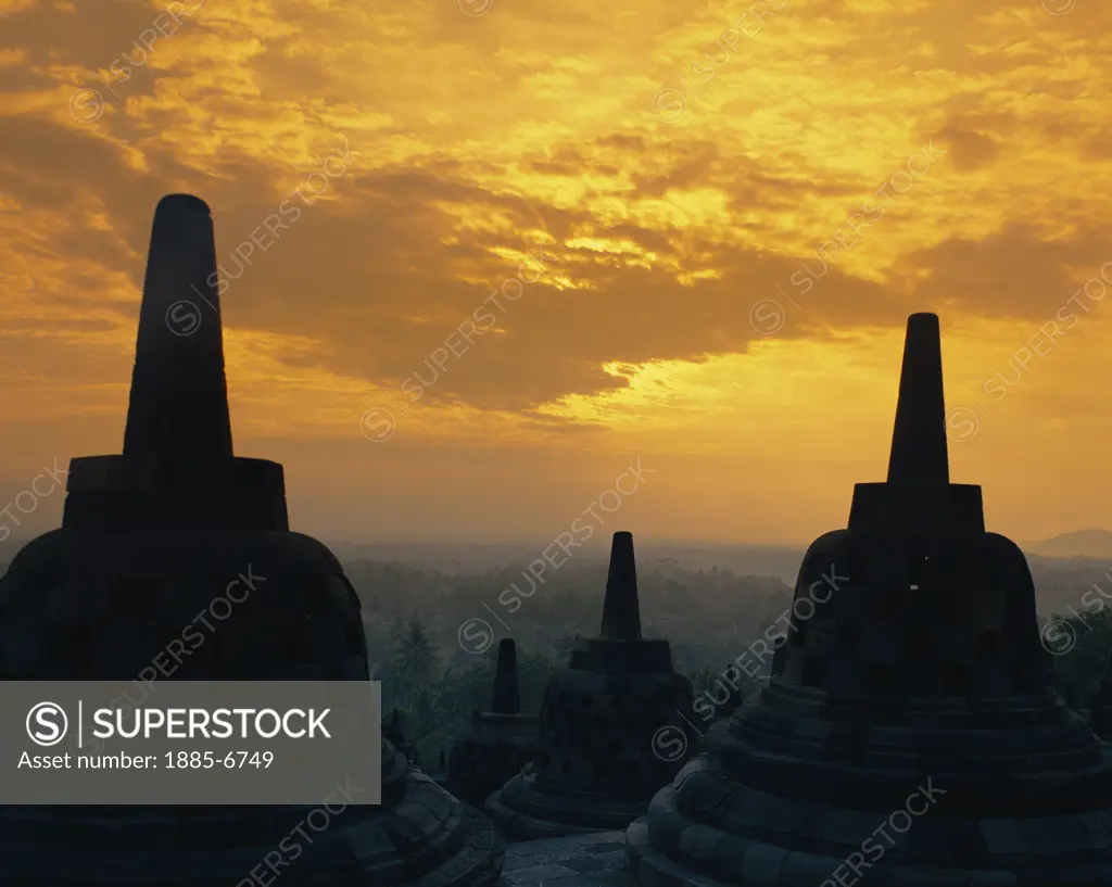Indonesia, Java, Borobudor, Buddhist Temple at Sunset