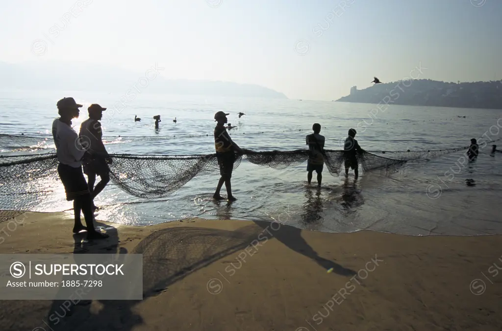 Mexico, Guerrero State, Acapulco, Local Fishermen at Dawn