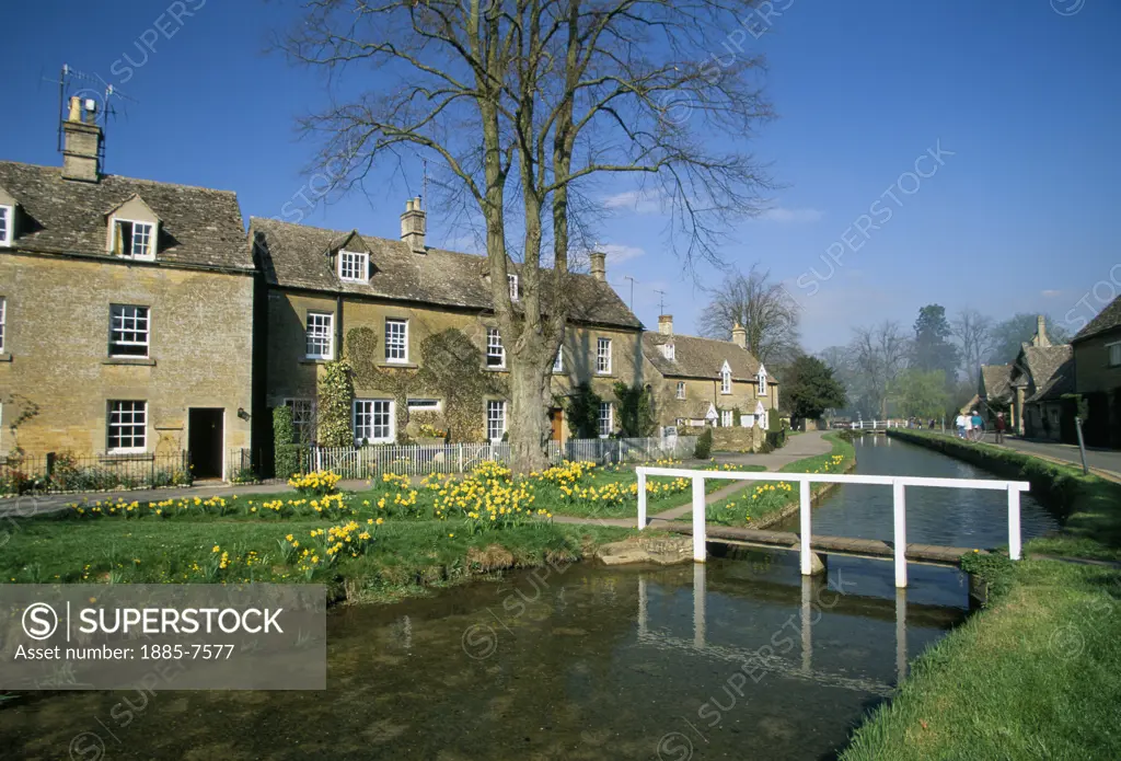 UK - England, Gloucestershire, Lower Slaughter, Cottages By River Eye (spring)