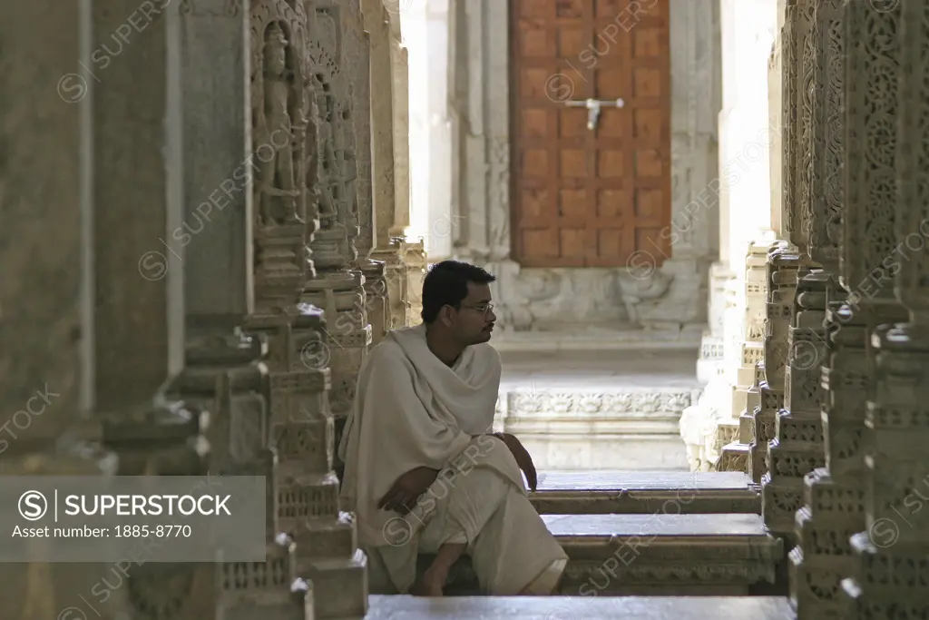 India, Rajasthan, Ranakpur, Adinatha Temple - interior with monk