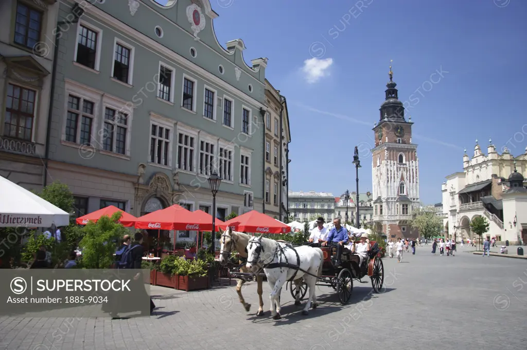 Poland, , Krakow, Market Square. Horse & carriage.