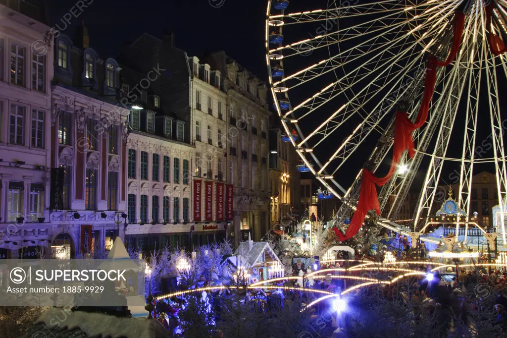 France, Nord pas de Calais, Lille, Grande-Place and ferris wheel at night 