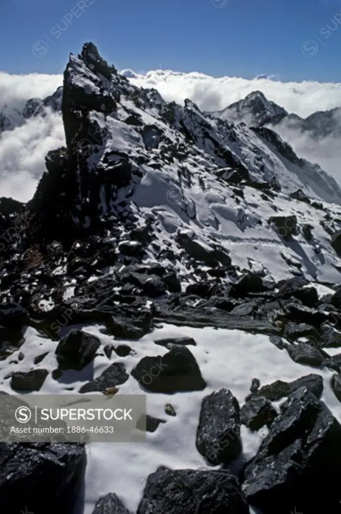 Snow covered rock outcrop on Paldol ridge in the GANESH HIMAL - NEPAL HIMALAYA