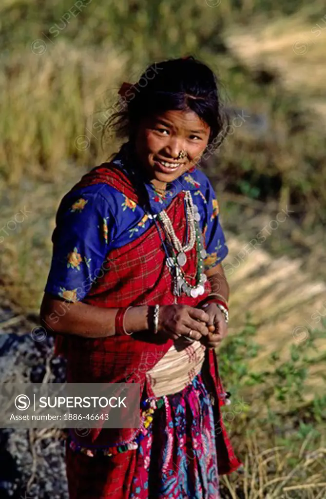 Young NEPALI girl smiling - GANESH HIMAL, NEPAL
