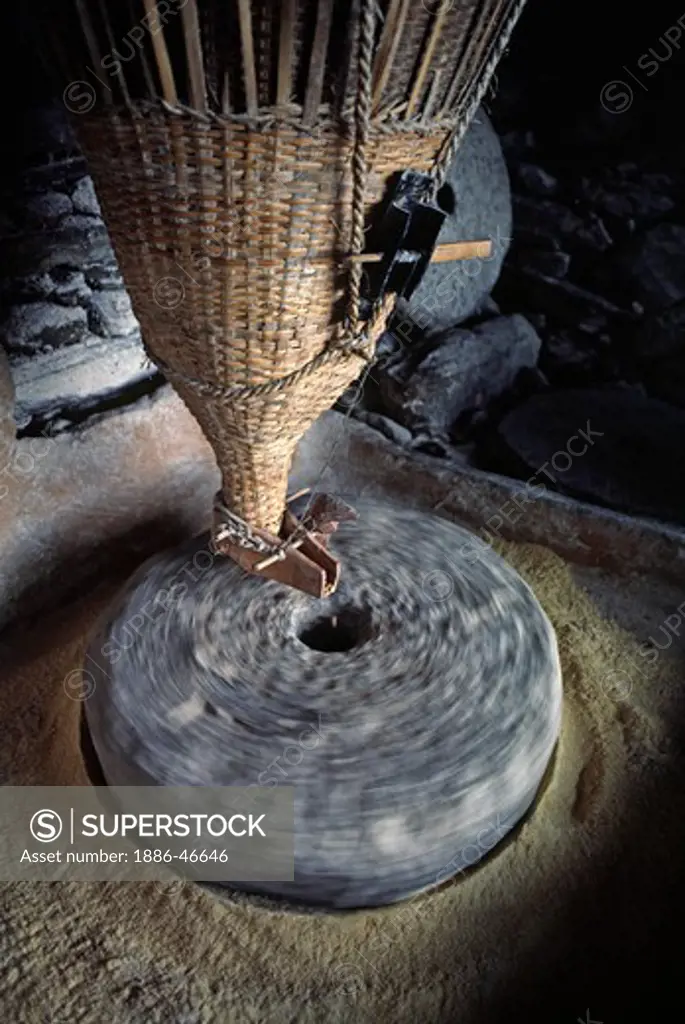 Water powered corn grinding stone - GANESH HIMAL, NEPAL