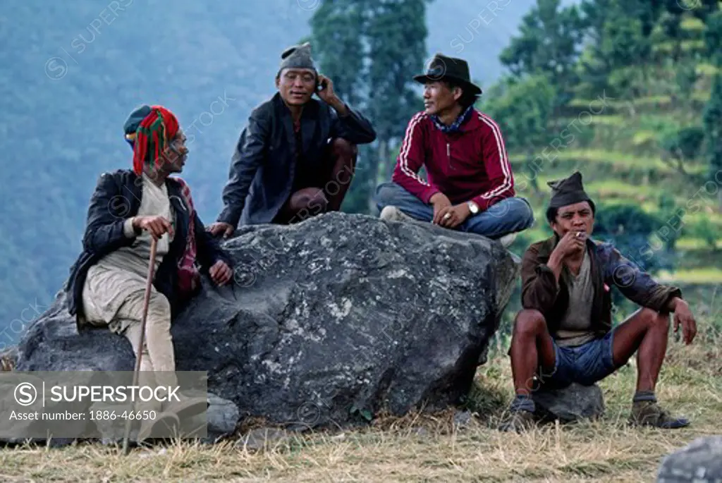 My trekking crew & a fellow traveler rest on the trail - GANESH HIMAL, NEPAL