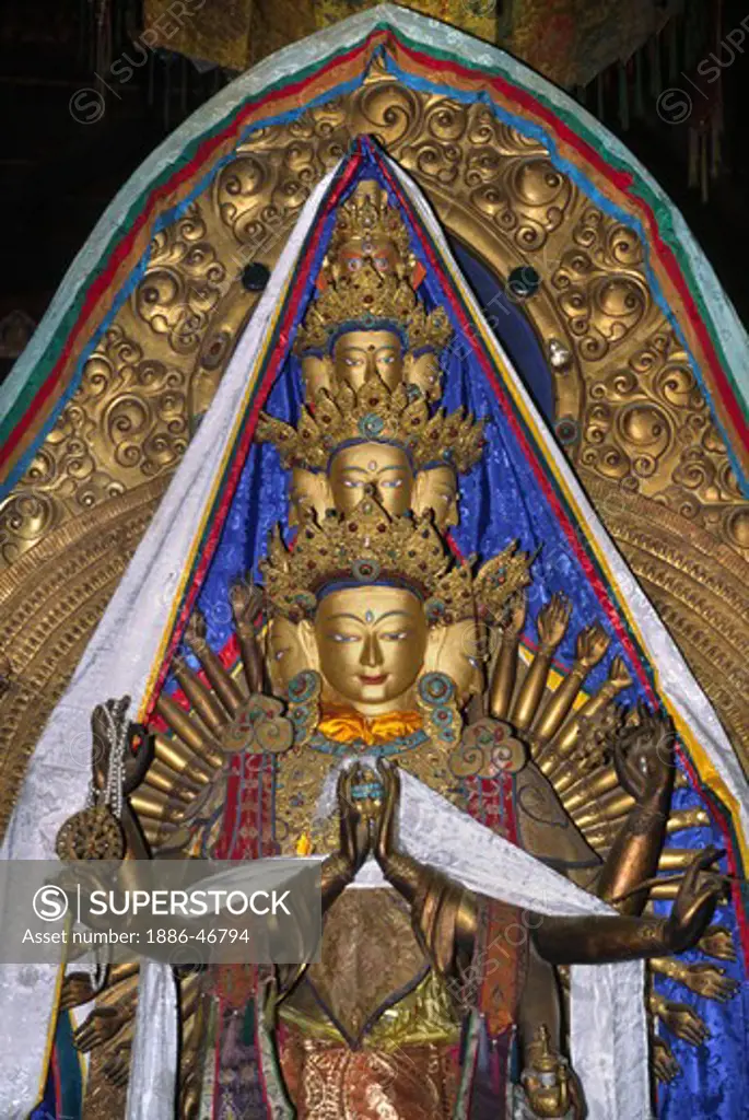THOUSAND ARMED AVALOKITESHVARA in the JOKHANG, TIBET'S holiest temple, built by KING SONGTSEN GAMPO in the 7th  Century - LHASA, TIBET