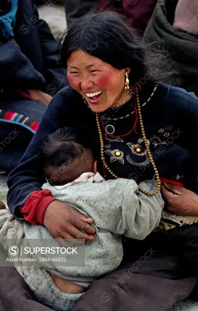 AMDO mother & child visit SERA MONASTERY which dates back to the 15th century - LHASA, TIBET