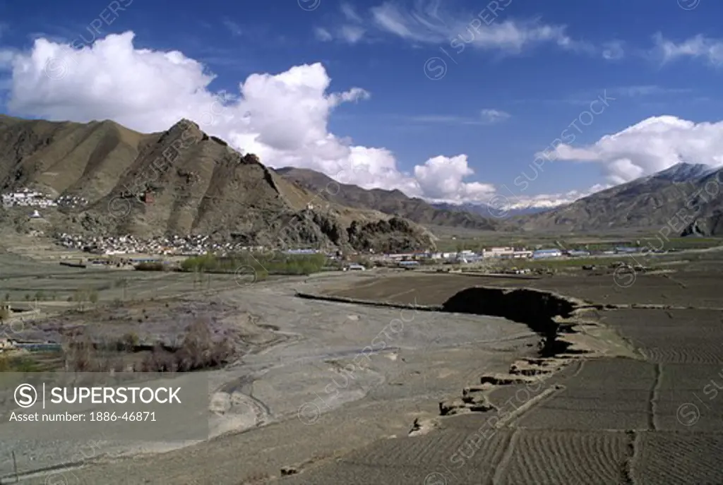 View of the CHONGGYE VALLEY near Yarlung Valley with RIWO DECHEN GOMPA & ruins of CHINGWA TAKTSE CASTLE - TIBET
