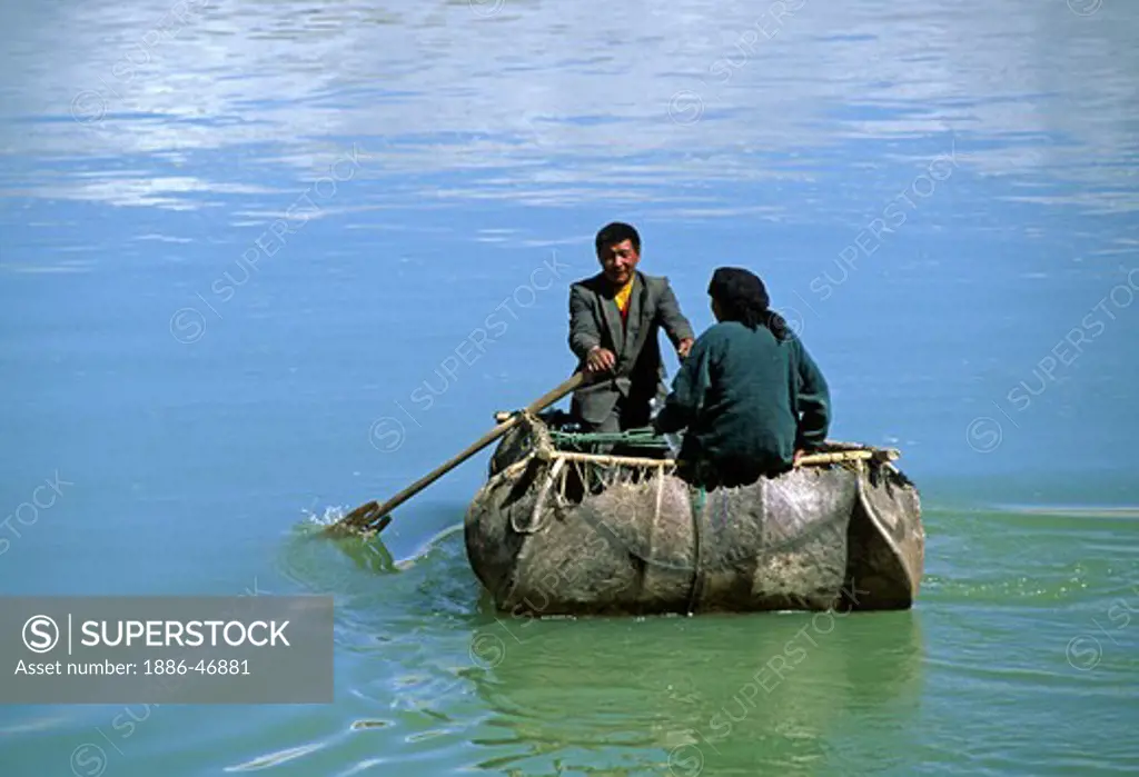 YAK SKIN BOATS are used to cross the YARLUNG TSANGPO or BRAMAPHUTRA RIVER - YARLUNG VALLEY, TIBET