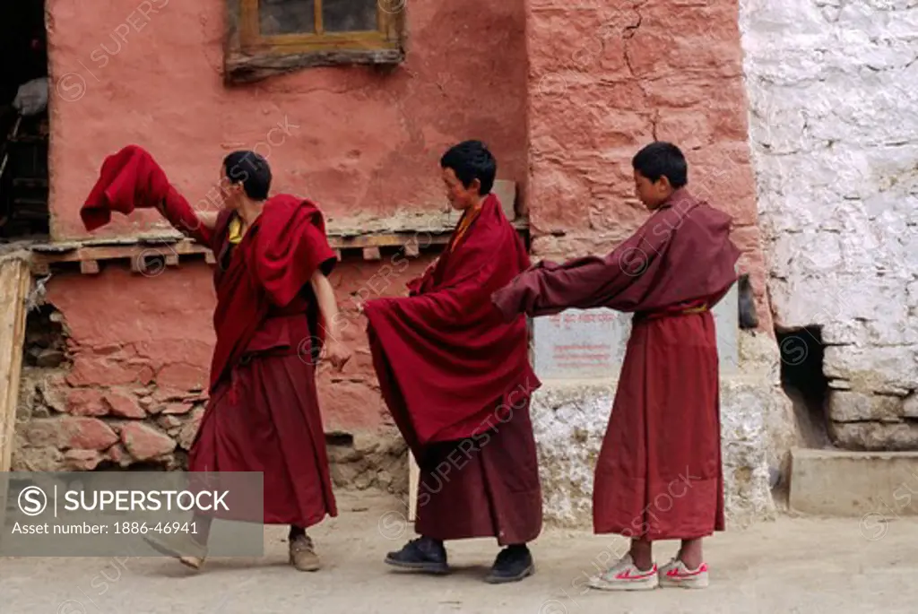 MONKS of the KAGYU SECT of TIBETAN BUDDHISM practice their ceremonial dances at DRIGUNG MONASTERY  - TIBET
