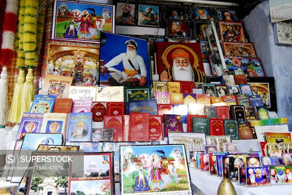 Shop selling pictures of Sikh Gurus including Guru Nanak Saheb outside Sachkhand Gurudwarasaheb Gurudwara sahib at Nanded, Maharashtra, India