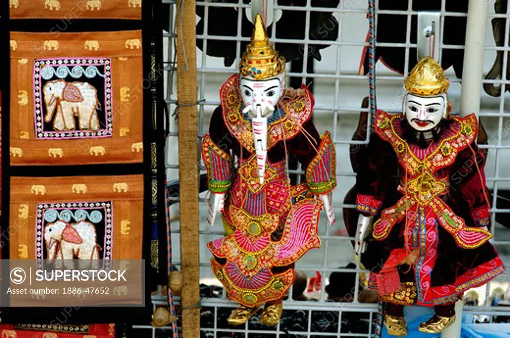 Elephant motif on fabric art & dolls on sale outside Buddha temple Bangkok ; Thailand ; South East Asia