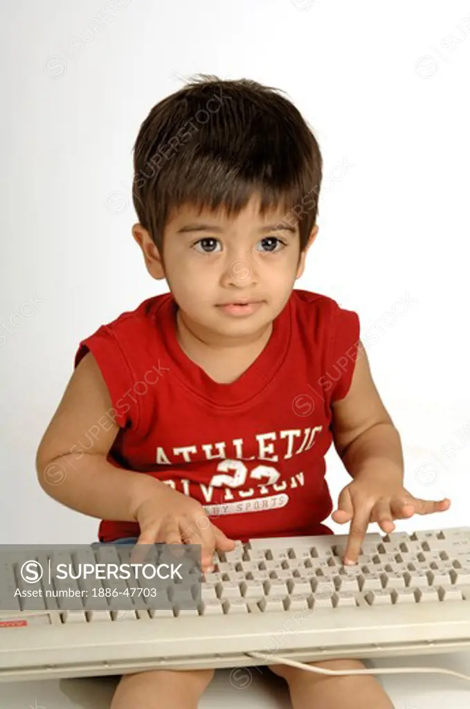 Indian Boy Learning Computer ; Finger Control ; MR